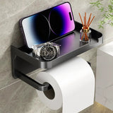 Toilet paper holder shelf used in a kitchen to hold paper towel and seasoning bottles