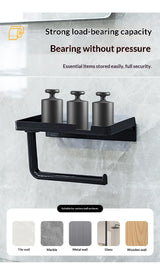 Black wall-mounted paper towel holder with three cylindrical holders on top, shown against a light gray tiled wall. Text above claims strong load-bearing capacity and essential items stored easily; bottom panel shows suitable wall types including tile wall, marble, metal wall, glass, and wooden wall.
